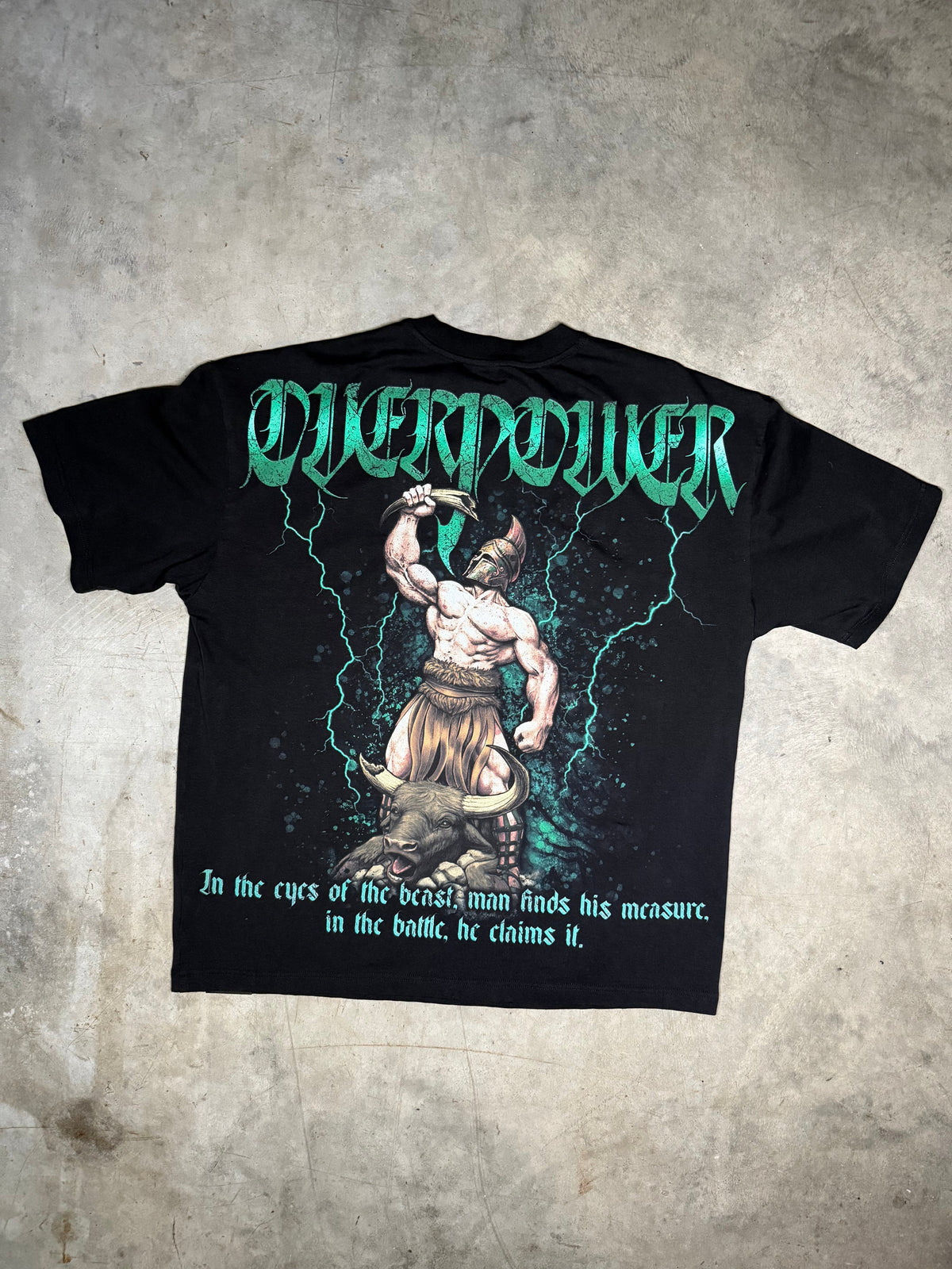 OverPower Strength Wear Hercules and the Horn of Abundance oversized tee laid flat, back view with green gothic print