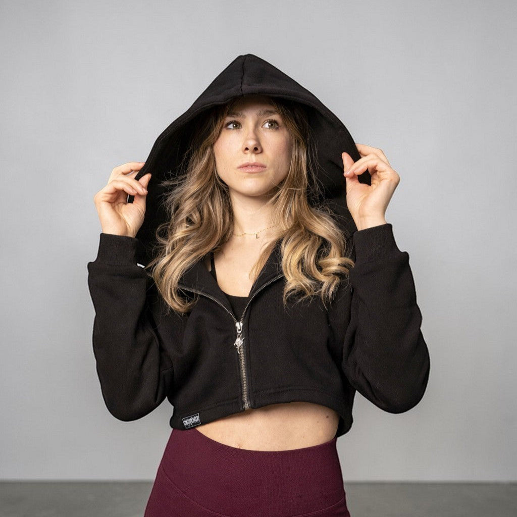 OverPower Strength Wear black cotton fleece crop zip-up hoodie with custom metal zipper and hood.