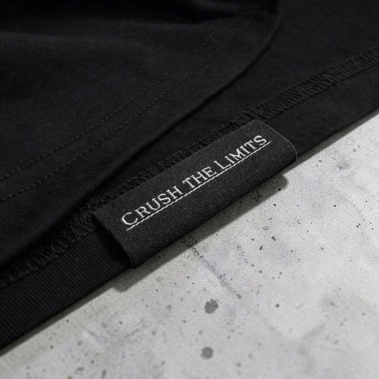 OverPower Strength Wear black oversized cotton blend graphic tee with "CRUSH THE LIMITS" tag.