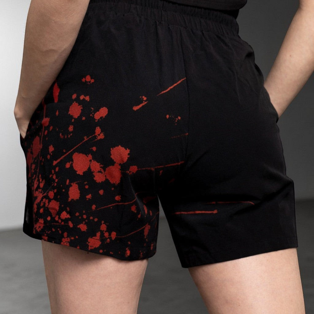 OverPower Strength Wear unisex black nylon/spandex shorts with red blood splatter graphic. Ideal for MMA, BJJ, and training.